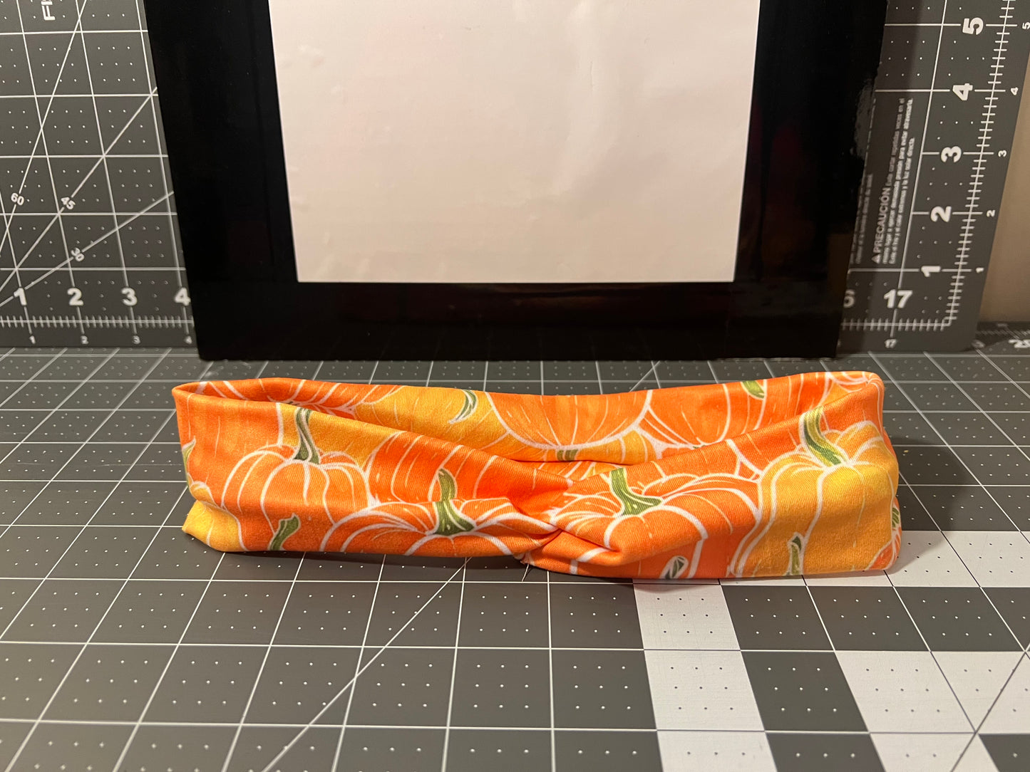 One adult size twist headband pumpkin patch